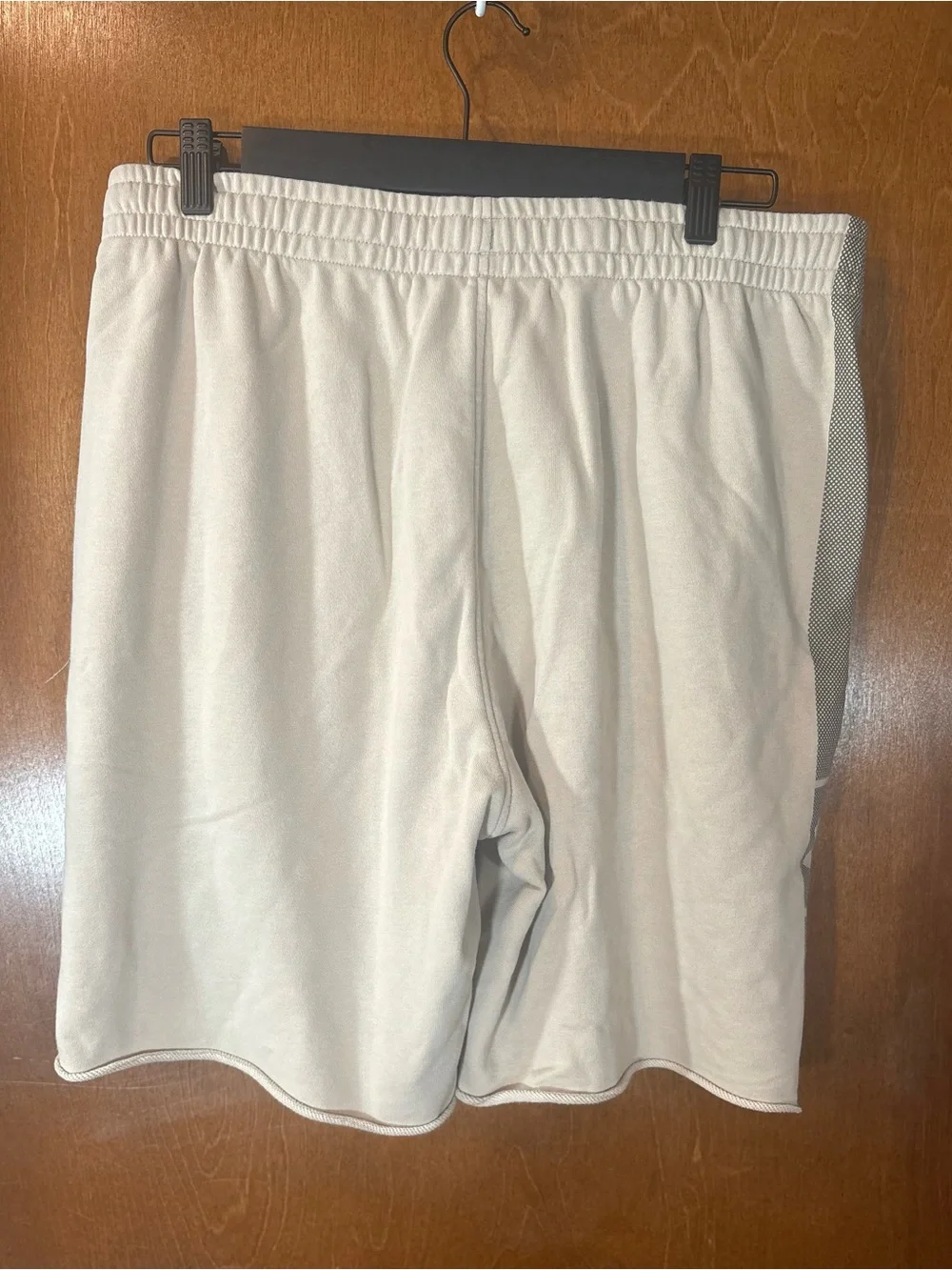 Under Armour Men's Tan Athletic Shorts with Gray Mesh Print Side Panel